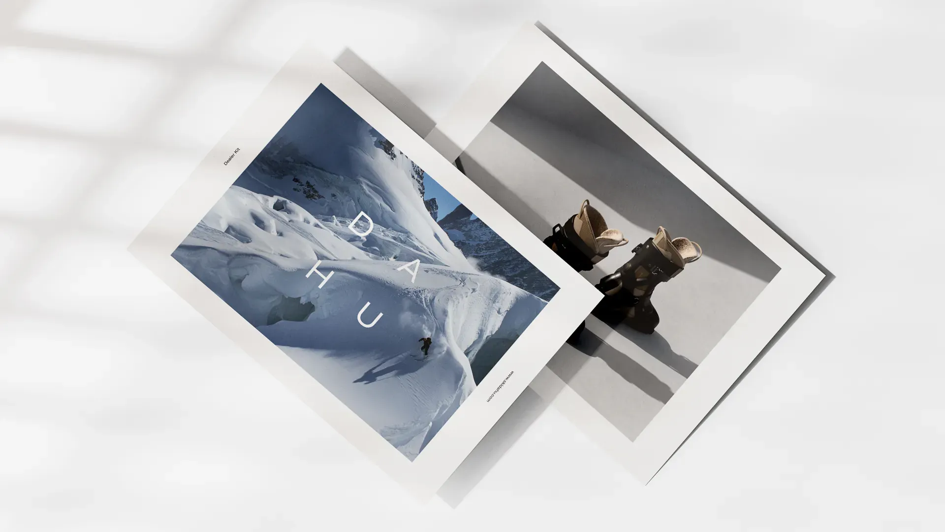 Dahu media kit spreads showing a skier on a snowy slope and ski boots in the snow